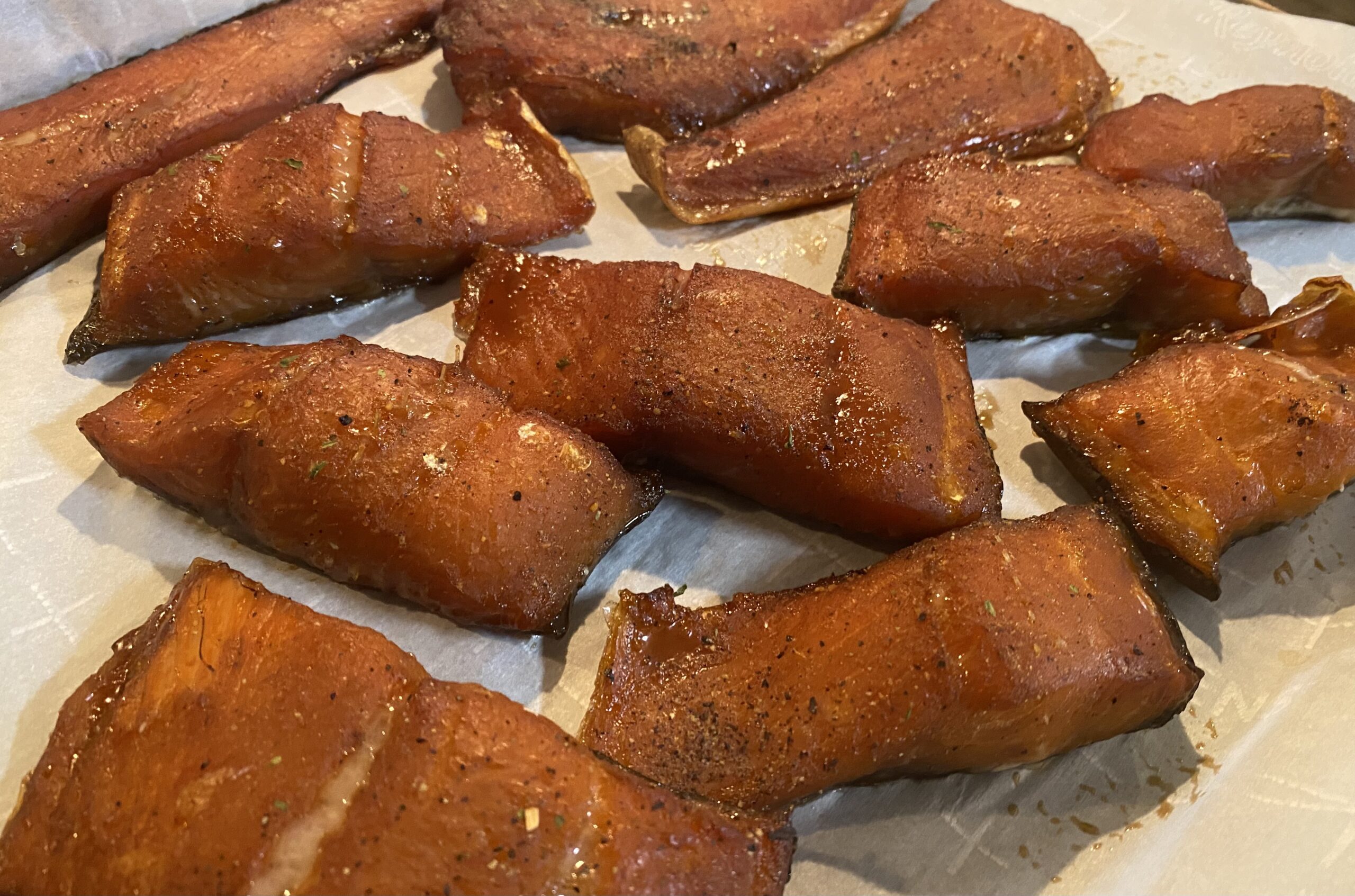 Brown sugar-cured smoked salmon portions and tails